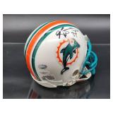 Autographed Mini Helmet by NFL Running Back "Ricky Williams" with COA