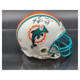 Autographed Mini Helmet by NFL Running Back "Ricky Williams" with COA