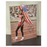 Autographed Photo by Olympic Gold Winner "Carl Lewis" No COA