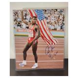 Autographed Photo by Olympic Gold Winner "Carl Lewis" No COA