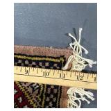 Intricate Miniature Decorative Rug