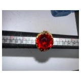 Vintage Gold Tone Ring with Large Red Faceted Glass Stone