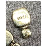 Sterling Silver Earrings with Purple Gemstones