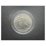 1943 AU++ Walking Liberty Half Dollar. Very Lightly circulated. Near full mint luster. Full mint details remain on collar, hairline, left hand and left leg.