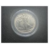 1943 AU++ Walking Liberty Half Dollar. Very Lightly circulated. Near full mint luster. Full mint details remain on collar, hairline, left hand and left leg.