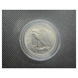 1943 AU++ Walking Liberty Half Dollar. Very Lightly circulated. Near full mint luster. Full mint details remain on collar, hairline, left hand and left leg.