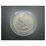 1943 AU++ Walking Liberty Half Dollar. Very Lightly circulated. Near full mint luster. Full mint details remain on collar, hairline, left hand and left leg.