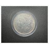 1921 Au+ Morgan Dollar - Details. Very light wear, cleaned.