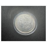 1921 Au+ Morgan Dollar - Details. Very light wear, cleaned.