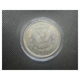 1921 Au+ Morgan Dollar - Details. Very light wear, cleaned.