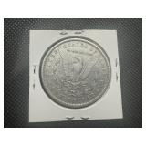 1885 VF+ Morgan Dollar. Authentic patina with some mint luster remaining.