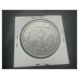 1885 VF+ Morgan Dollar. Authentic patina with some mint luster remaining.