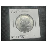 1964 D Uncirculated Kennedy Half Dollar. Very few bag marks. Full mint luster.