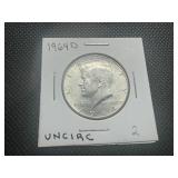 1964 D Uncirculated Kennedy Half Dollar. Very few bag marks. Full mint luster.
