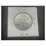 1964 D Uncirculated Kennedy Half Dollar. Very few bag marks. Full mint luster.