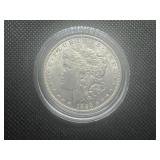 1896 Uncirculated Morgan Dollar. Full, flashy mint luster.  Significant but not distracting bagmarks in the field on the obverse, otherwise a great coin.