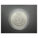 1896 Uncirculated Morgan Dollar. Full, flashy mint luster.  Significant but not distracting bagmarks in the field on the obverse, otherwise a great coin.