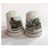 Two Dinosaur Thimbles. Tyrannosaurus and Triceratops
