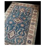 Handwoven Oriental Rug with Blue and Ivory Pattern