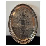 Collection of Vintage Silverplate Serving Pieces Including Trays, Pitchers, and Covered Dishes