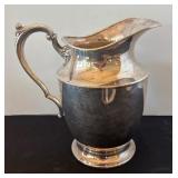 Collection of Vintage Silverplate Serving Pieces Including Trays, Pitchers, and Covered Dishes