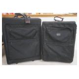 2 suitcases on wheels with handles 2 suitcases on wheels with handles