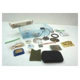 Bin of Belt Buckles, pins, clasps, patches and more Bin of Belt Buckles, pins, clasps, patches and more