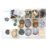 Organizer with various tokens, metals, and other jewelry Organizer with various tokens, metals, and other jewelry