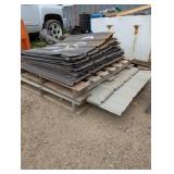 Large Pile of Metal Siding/Roofing - 14 -62" x 36 in panels & 40- 35" x36" panels Large Pile of Metal Siding/Roofing - 14 -62" x 36 in panels & 40- 35" x36" panels