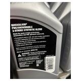 bottles of Quicksilver full synthetic snowmobile 2 stroke oil