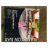 Hampton Bay Sadler 29.33 in.W Rubbed Bronze Steel Wood Outdoor Fire Pit with Cover and Poker Included    Customer Returns See Pictures