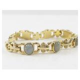 Gold-Tone Bracelet with Green Stone Accents