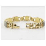 Gold-Tone Bracelet with Green Stone Accents