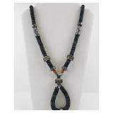 Ethnic Style Necklace with Black Disc Beads and Ornate Silver-Tone Accents