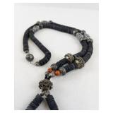 Ethnic Style Necklace with Black Disc Beads and Ornate Silver-Tone Accents