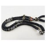 Ethnic Style Necklace with Black Disc Beads and Ornate Silver-Tone Accents