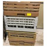 lot of commercial dishwashing racks