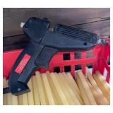 Target Shopping Basket Almost Full of Glue Sticks with Dexter Hysol 2000-HP Glue Gun