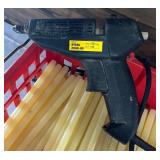 Target Shopping Basket Almost Full of Glue Sticks with Dexter Hysol 2000-HP Glue Gun