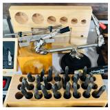 Collection of Jewelry Making and Metalworking Tools with Hammers, Stamps, and Accessories