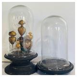 Two Glass Cloches on Wooden Pedestal one with Decorative Tin Sacred Hearts