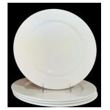 A Set of 8 Assorted Ivory Dinner Plates
