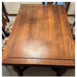 Antique Expandable Dining Table with 6 Ornately Carved Chairs Antique Expandable Dining Table with 6 Ornately Carved Chairs