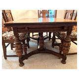 Antique Expandable Dining Table with 6 Ornately Carved Chairs Antique Expandable Dining Table with 6 Ornately Carved Chairs