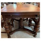 Antique Expandable Dining Table with 6 Ornately Carved Chairs Antique Expandable Dining Table with 6 Ornately Carved Chairs