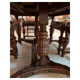 Antique Expandable Dining Table with 6 Ornately Carved Chairs Antique Expandable Dining Table with 6 Ornately Carved Chairs