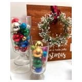 Holiday Decor Collection with Christmas Sign, Artificial Poinsettias, Ornaments, and Angel Figure Holiday Decor Collection with Christmas Sign, Artificial Poinsettias, Ornaments, and Angel Figure