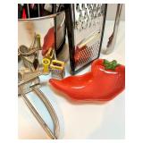 Large Kitchen Utensil Lot with Graters, Tongs, and Collectible Red Pepper Dish Large Kitchen Utensil Lot with Graters, Tongs, and Collectible Red Pepper Dish