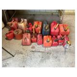 Collection of 14 Used Fuel Cans of Various Sizes and Colors