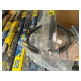 Assorted Automotive Parts Including Wiper Blades, Coupler, and Hubcaps